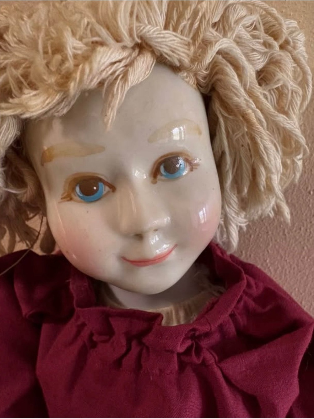 Porcelain Doll with Cream Yarn Hair and Burgundy Dress